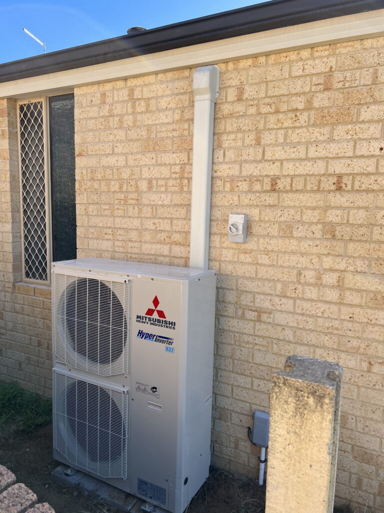 air conditioner on wall outside